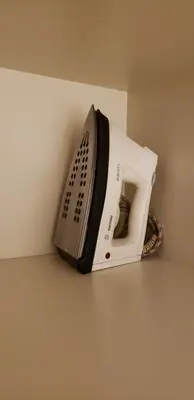 a toaster oven sitting on the corner of a wall at Departamento céntrico con hermosa vista a las Sierras in Cordoba