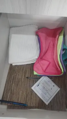 a box with two pencils and a paper in it at Anicca Alberdi Córdoba Centro in Cordoba