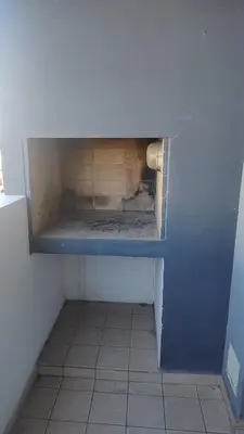 a empty shelf in a corner of a room at Anicca Alberdi Córdoba Centro in Cordoba