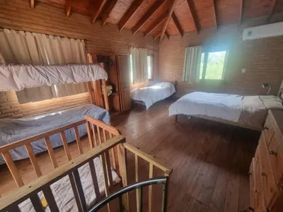 an overhead view of a bedroom with two beds at Duplex Las Violetas in Merlo