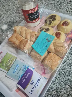 a tray of pastries and breads on a table at Dálet in Villa Parque Siquiman