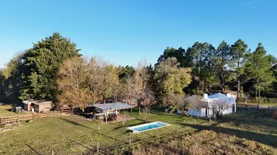 an aerial view of a yard with a pool and a house at Real del Cóndor San Clemente in San Clemente