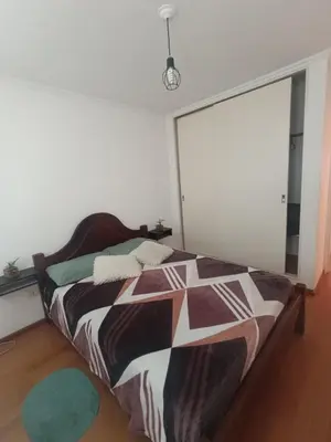a bedroom with a bed and a large window at Nueva Córdoba Ambrosio Olmos 898 pleno bv a metros de plaza España la universidad clínicas gastronomía etc etc in Cordoba