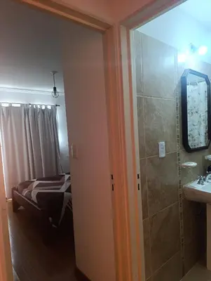 a room with a bathroom with a shower and a sink at Nueva Córdoba Ambrosio Olmos 898 pleno bv a metros de plaza España la universidad clínicas gastronomía etc etc in Cordoba