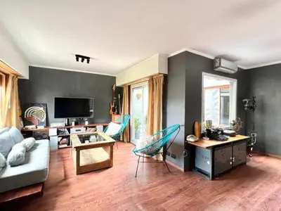 a living room with a couch and chairs in it at Casa alojamiento in Cordoba