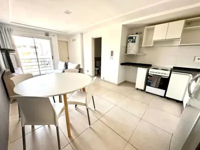 a kitchen and dining room with a table and chairs at Alojamiento entero para 2 personas E in Cordoba