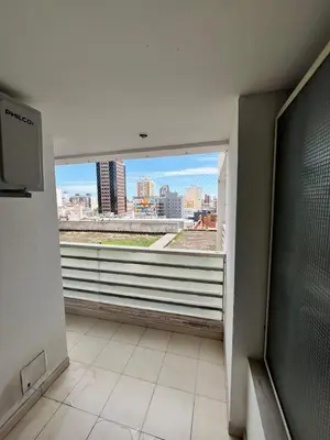 a room with a large window with a view of a city at Jardines del Boulevard 6 in Cordoba
