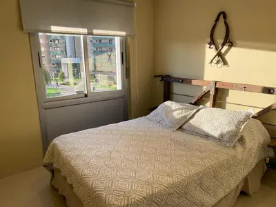 a bedroom with a bed and a window at Departamento en Altos de Villa Sol y Seguridad 24h - Córdoba, Argentina in Cordoba