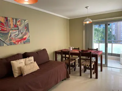 a living room with a couch and a table at Departamento en Altos de Villa Sol y Seguridad 24h - Córdoba, Argentina in Cordoba
