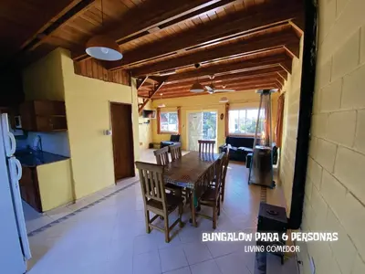 a kitchen and dining room with a table and chairs at Complejo BIALET MASSE in Bialet Massé