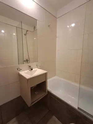 a bathroom with a sink and a tub and a shower at Chacabuco 400 B Nueva Cordoba in Cordoba