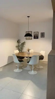 a dining room with a table and chairs at Departamento Plaza Colón in Cordoba