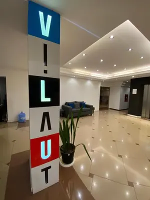 a lobby with a sign with the word rent at Estudio Lino in Cordoba