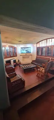 a view of a room with chairs and a stage at Casa Villa Carlos Paz in Villa Carlos Paz