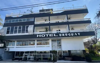 a hotel uzbekistan building with a hotel overview at Hotel Nuevo Uruguay in Villa Carlos Paz