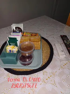 a tray of food sitting on top of a table at El Carpo in Santa Rosa de Calamuchita