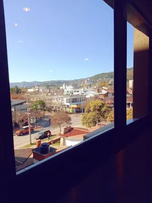 a view of a city from a window at Village Tower - Hermoso departamento en excelente ubicación in Villa Carlos Paz
