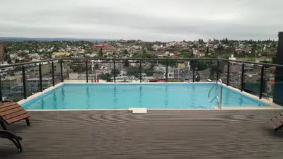 a large swimming pool on top of a building at Miralejos 17 in Villa Carlos Paz