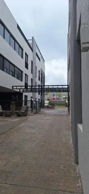 an empty street in front of a building at Miralejos 17 in Villa Carlos Paz