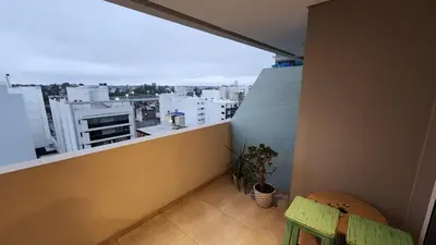 a balcony with a view of a city at Torre GNI Cofico in Cordoba