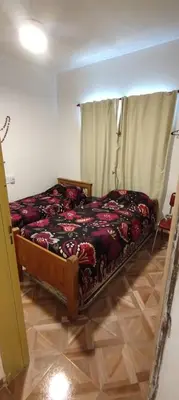 a bedroom with a bed in a room at Pan de Azúcar 3 dias mínimo de alojamiento in Villa Parque Siquiman