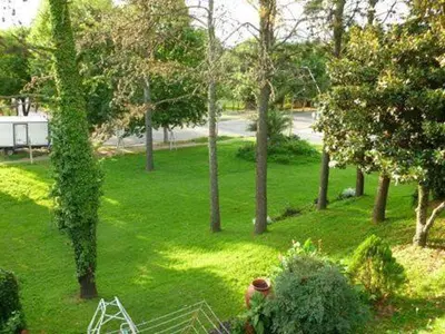 an aerial view of a park with trees and grass at departamentos pama in Santa Rosa de Calamuchita