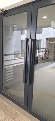 a close up of a glass door of a building at Miralejos 17 in Villa Carlos Paz