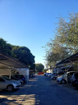 a row of cars parked in a parking lot at Departamento en calle 9 de Julio in Cordoba