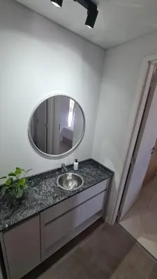 a bathroom with a sink and a mirror at ALLEGRA Lake Towers - Nuevo y moderno! Exc ubicación -Lo vas a amar in Villa Carlos Paz