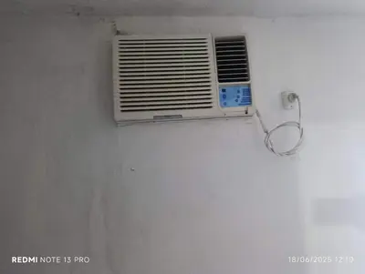 a room with a air conditioner on a wall at Soles in Cordoba