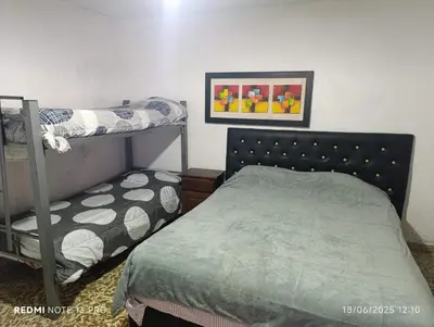 a bedroom with a bunk bed and a bunk bedskirts at Soles in Cordoba