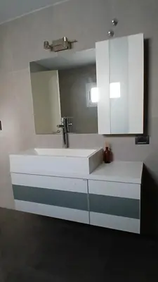 a bathroom with a white sink and a mirror at aleyluna in Berrotarán