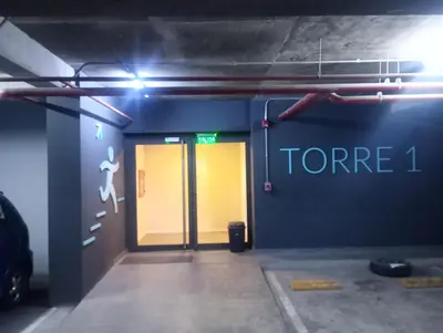 a room with a door with a sign that reads tone at Dpto Premium en Torre Cofico con cochera incluida - Pileta en Terraza in Cordoba