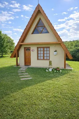 a small house with a gambrel roof at Chalet Alpino en las Sierras in Villa del Dique