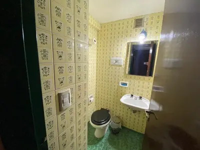 a bathroom with a toilet and a sink at Departamento Amoblado in Cordoba
