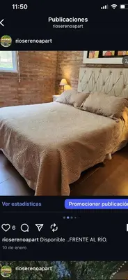 a page of a bedroom with a large bed at Rio Sereno in Santa Rosa de Calamuchita