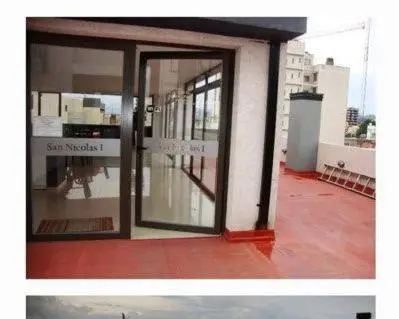 a store front with glass doors on a building at Dulces Sueños in Villa Carlos Paz