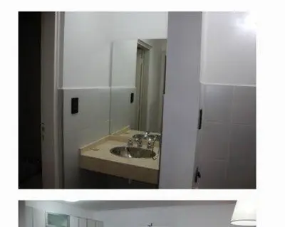 a bathroom with a sink and a mirror at Dulces Sueños in Villa Carlos Paz