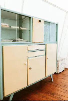 a large white cabinet with glass doors and drawers at Glamping Traslasierra Carpa Norte in San Javier