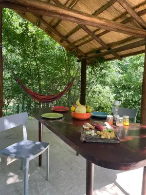 a wooden table with a tray of food on it at Caminito in Los Reartes