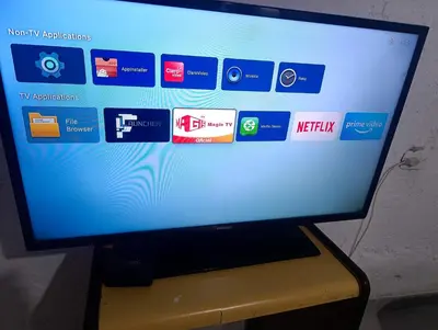 a television screen with a bunch of stickers on it at Departamento nubes in Cordoba