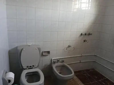 a bathroom with a toilet and a bidet at Tranquilidad y descanso in Cordoba