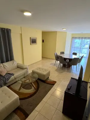 a living room with a couch and a table at Bv San Juan - Nueva Cordoba 2 in Cordoba