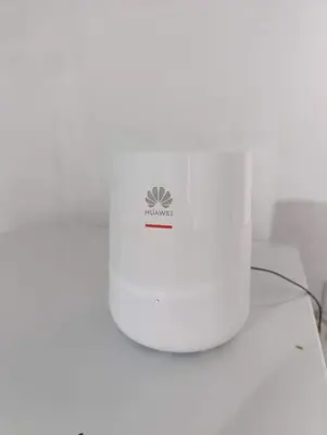 a white router sitting on top of a table at Departamento tolosa in Cordoba