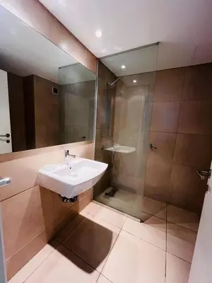 a bathroom with a sink and a shower at Cardinales in Cordoba