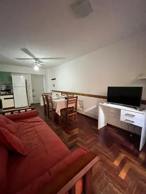a living room with a couch and a table at poeta lugones - nva cba in Cordoba
