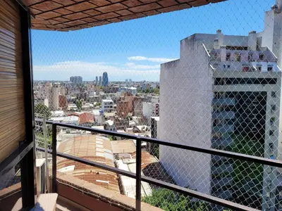 a view of the city from a balcony at Amplio, luminoso y cerca de todo! in Cordoba