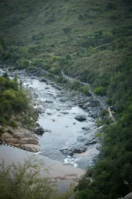 a view of a river with a road in the distance at Apartamento por día Cuesta Blanca in Cuesta Blanca