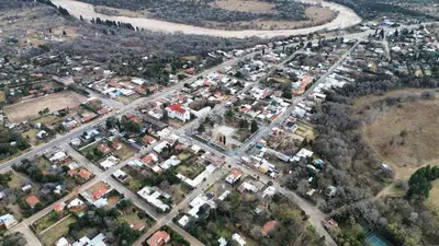 an aerial view of a city with houses at Departamento en Nono Descanso y aventura in Nono