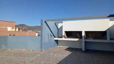 a building with a window on the side of it at Exelente departamento en Carlos Paz in Villa Carlos Paz